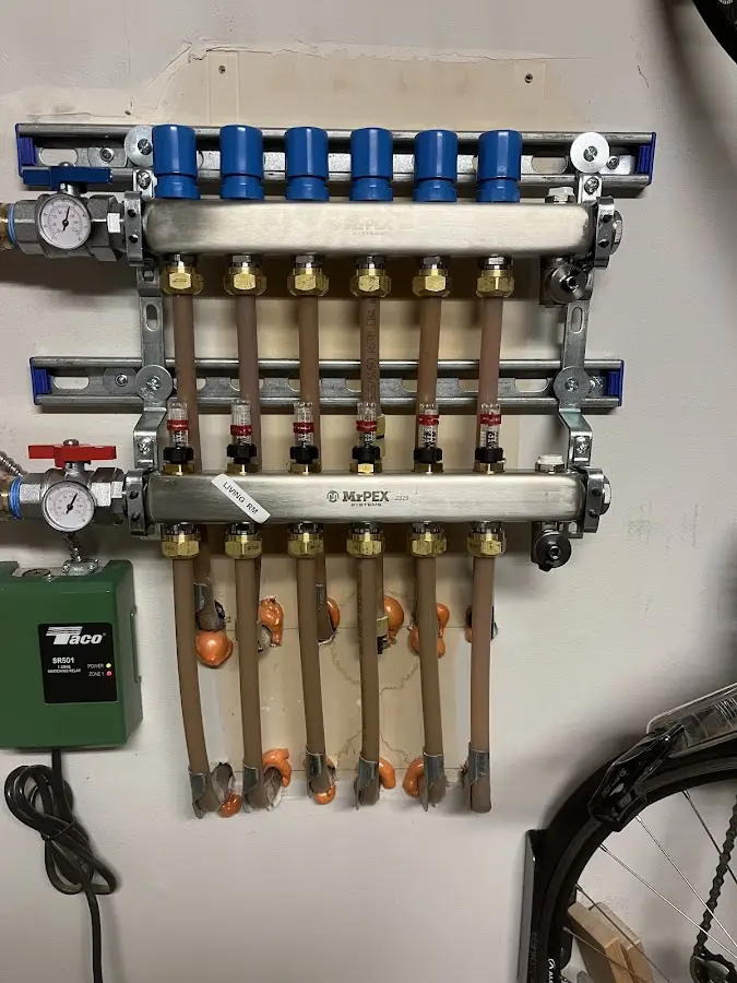 Plumber performing Gas Line Installation at a residential property in Bedford